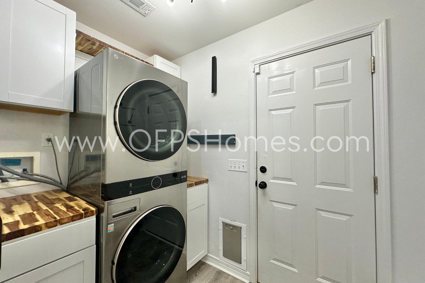 2426 Houston Circle Gulf Breeze, FL 32563 - Photo 13 of 25 a utility room with dryer and washer