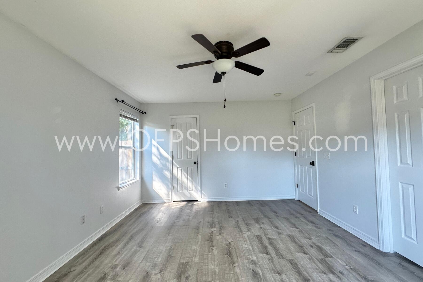 2426 Houston Circle Gulf Breeze, FL 32563 - Photo 15 of 25 a view of a hallway with a window