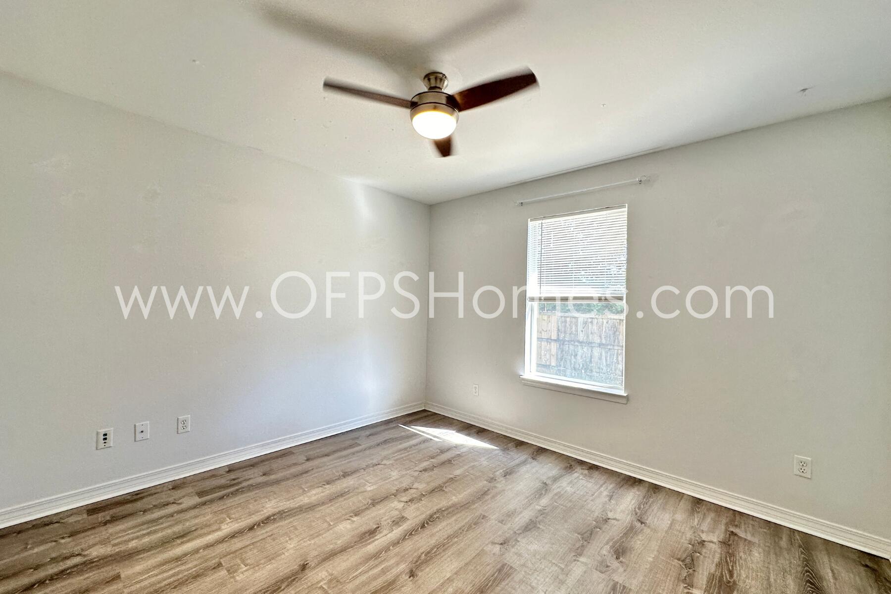 2426 Houston Circle Gulf Breeze, FL 32563 - Photo 20 of 25 wooden floor in an empty room with a window