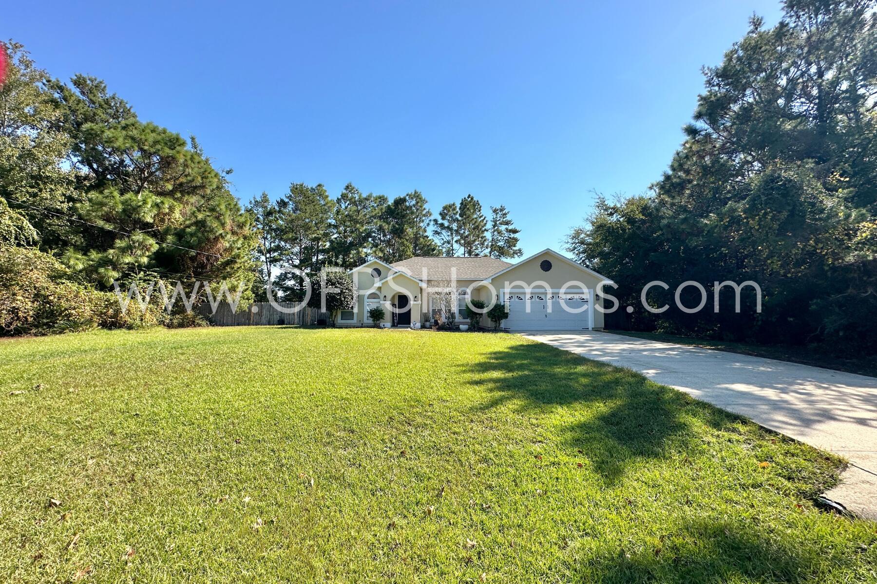 2426 Houston Circle Gulf Breeze, FL 32563 - Photo 2 of 25 a view of back yard