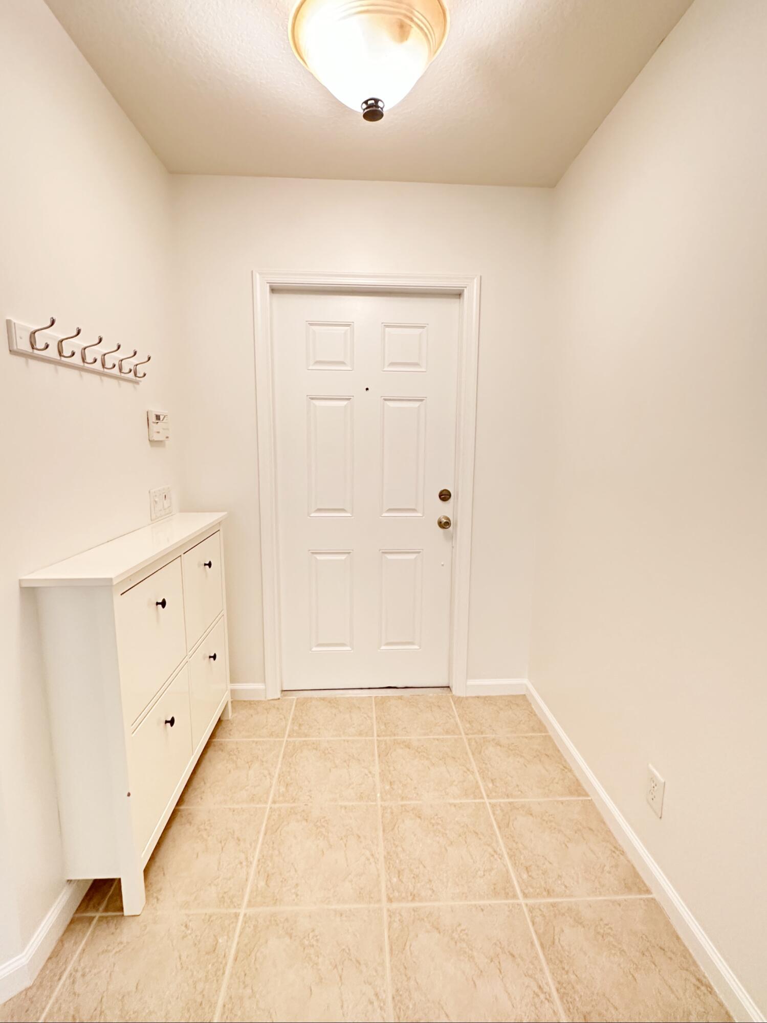 2662 Southwest Impala Way Stuart, FL 34997 - Photo 52 of 54 Entrance Foyer