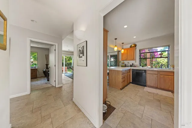 a view of a kitchen with a sink