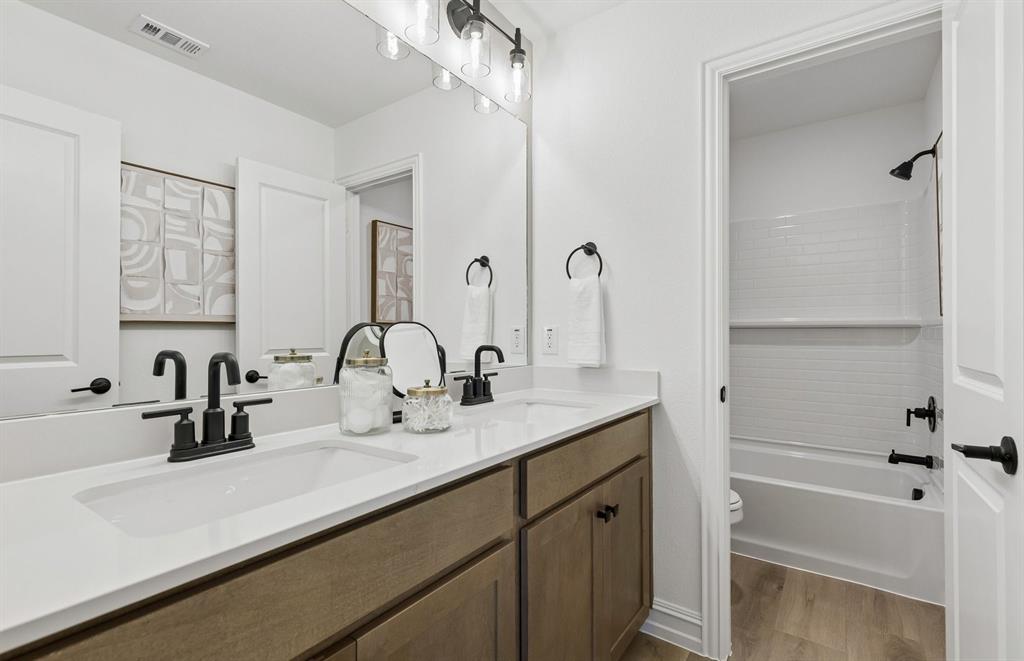 3325 Red Deer Road Denton, TX 76208 - Photo 19 of 19 *Model Representation - Spacious secondary bathroom