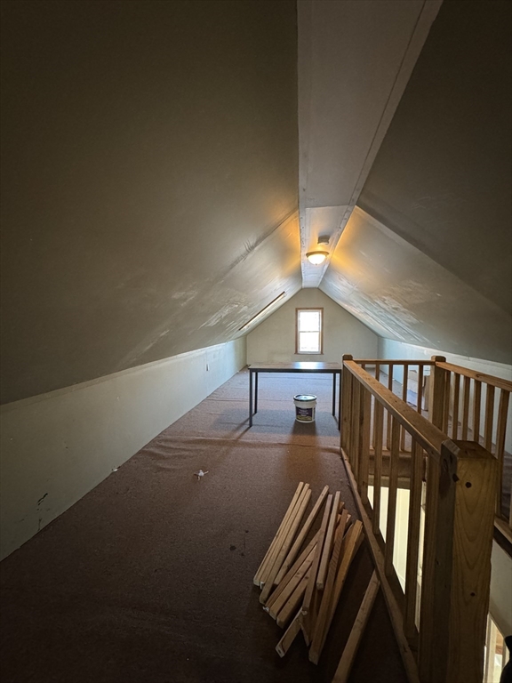 98 Lafayette Park, Unit 2 Lynn, MA 01902 - Photo 14 of 18 a view of staircase and hall with wooden floor