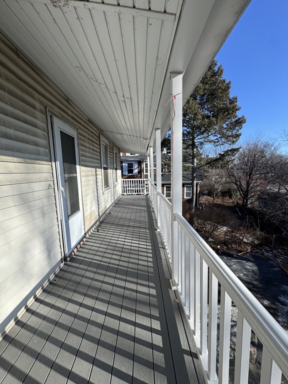 98 Lafayette Park, Unit 2 Lynn, MA 01902 - Photo 15 of 18 a view of balcony with wooden floor