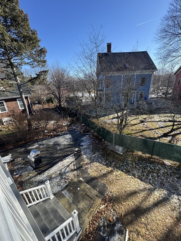 98 Lafayette Park, Unit 2 Lynn, MA 01902 - Photo 17 of 18 a view of a house with a yard