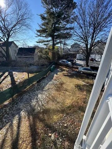 a view of swimming pool with a yard