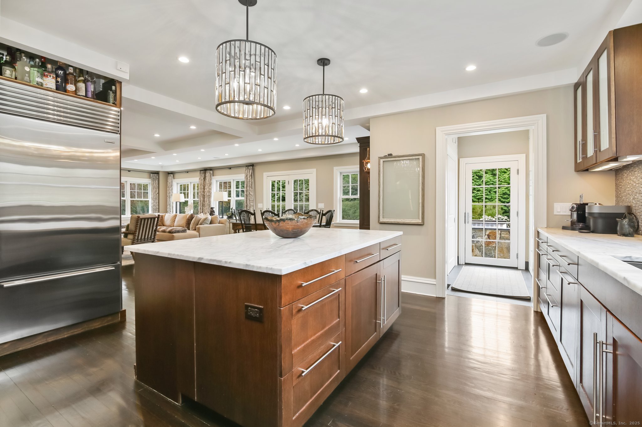 11 Old Hill Road Westport, CT 06880 - Photo 12 of 34 a kitchen with kitchen island granite countertop a sink and a stove
