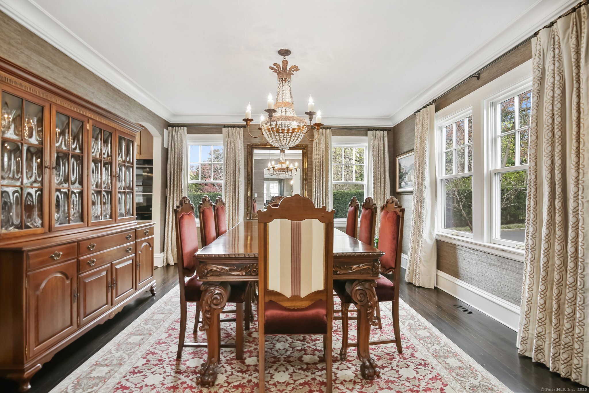11 Old Hill Road Westport, CT 06880 - Photo 15 of 34 a dining room with furniture a chandelier and wooden floor