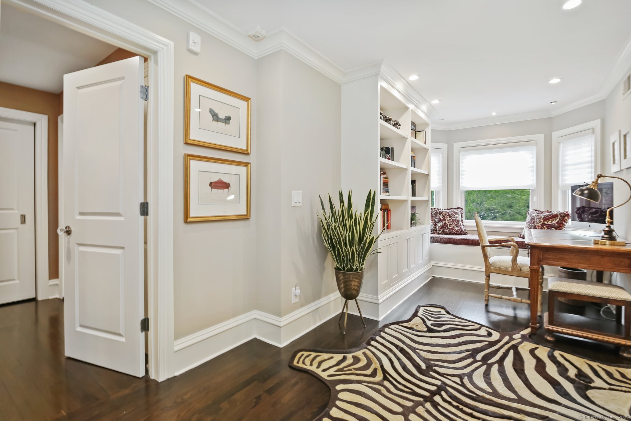 11 Old Hill Road Westport, CT 06880 - Photo 16 of 34 a living room with furniture and a potted plant