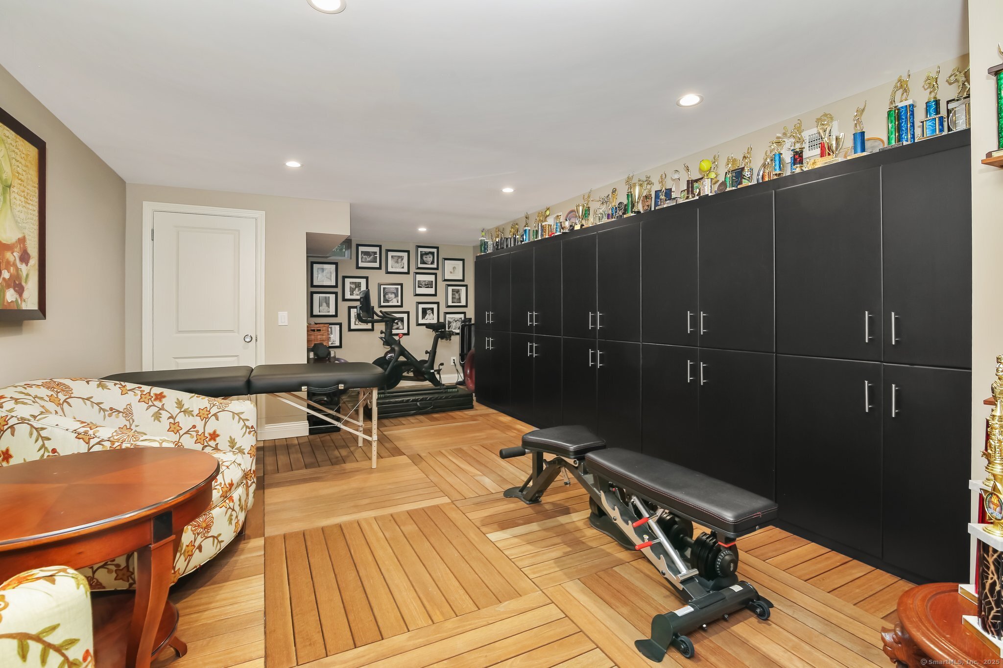 11 Old Hill Road Westport, CT 06880 - Photo 29 of 34 a living room with furniture a table and wooden floor