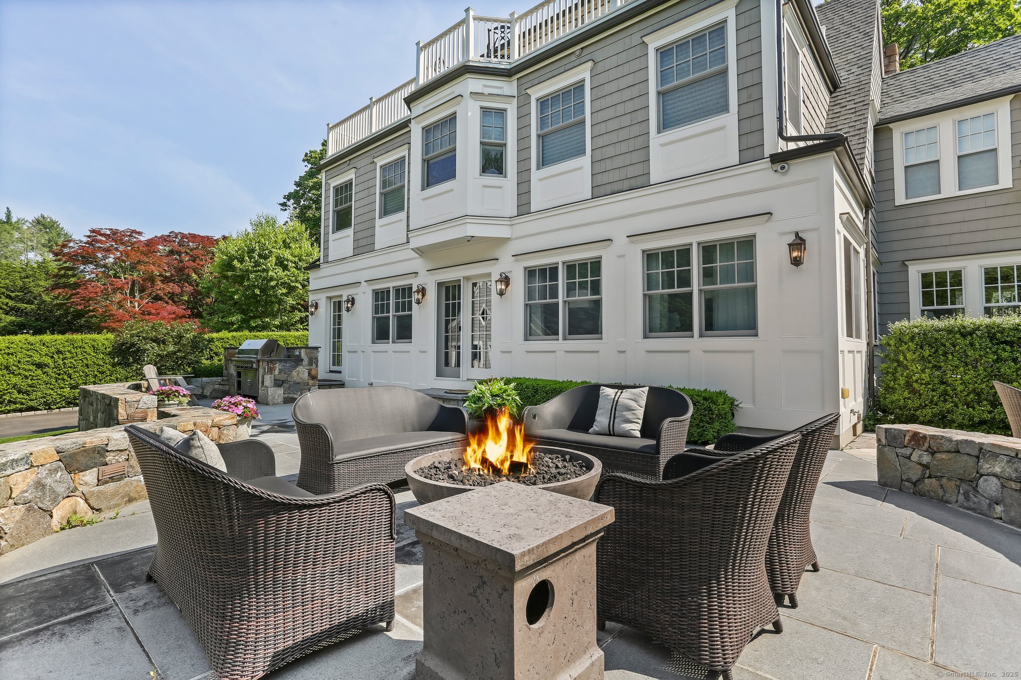 11 Old Hill Road Westport, CT 06880 - Photo 32 of 34 a view of a patio with couches table and chairs and potted plants