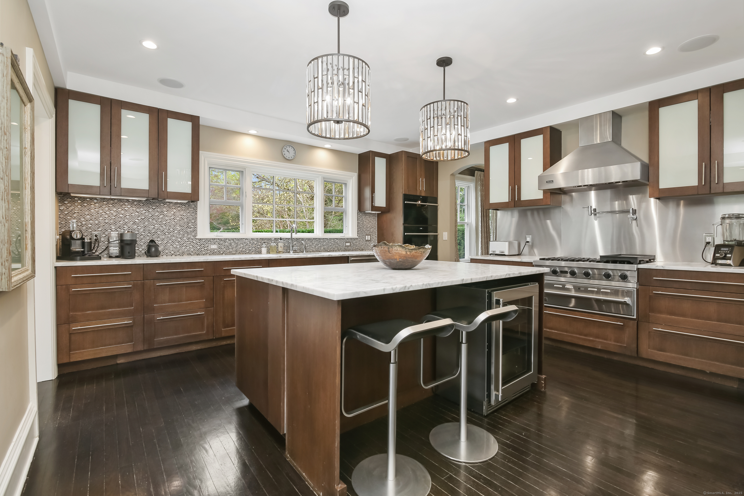 11 Old Hill Road Westport, CT 06880 - Photo 10 of 34 a kitchen with stainless steel appliances granite countertop a stove a sink and a refrigerator
