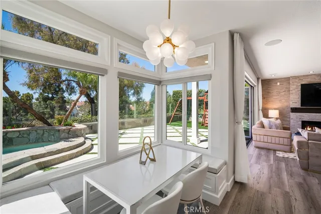 a kitchen with a stove a sink and a refrigerator