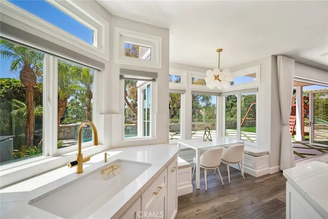 a bathroom with a sink a mirror and a bathtub
