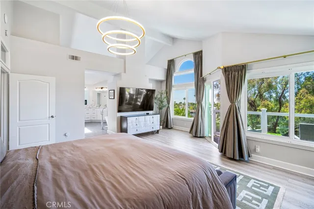 a bathroom with double vanity sinks and a shower