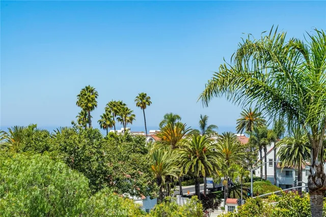a living room with fireplace furniture and a flat screen tv