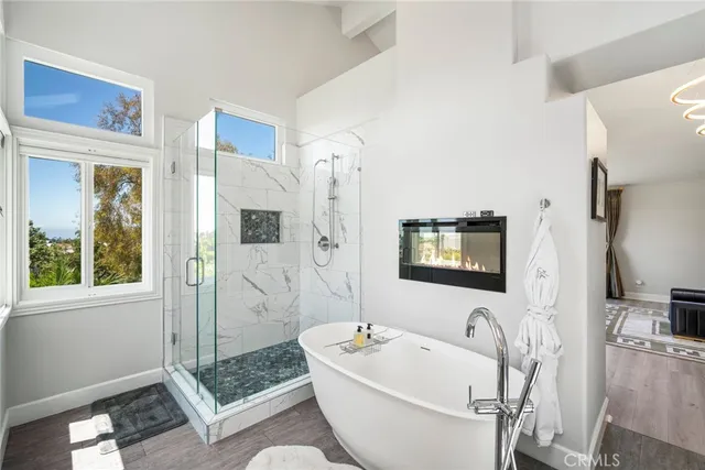 a bathroom with a sink vanity and a mirror