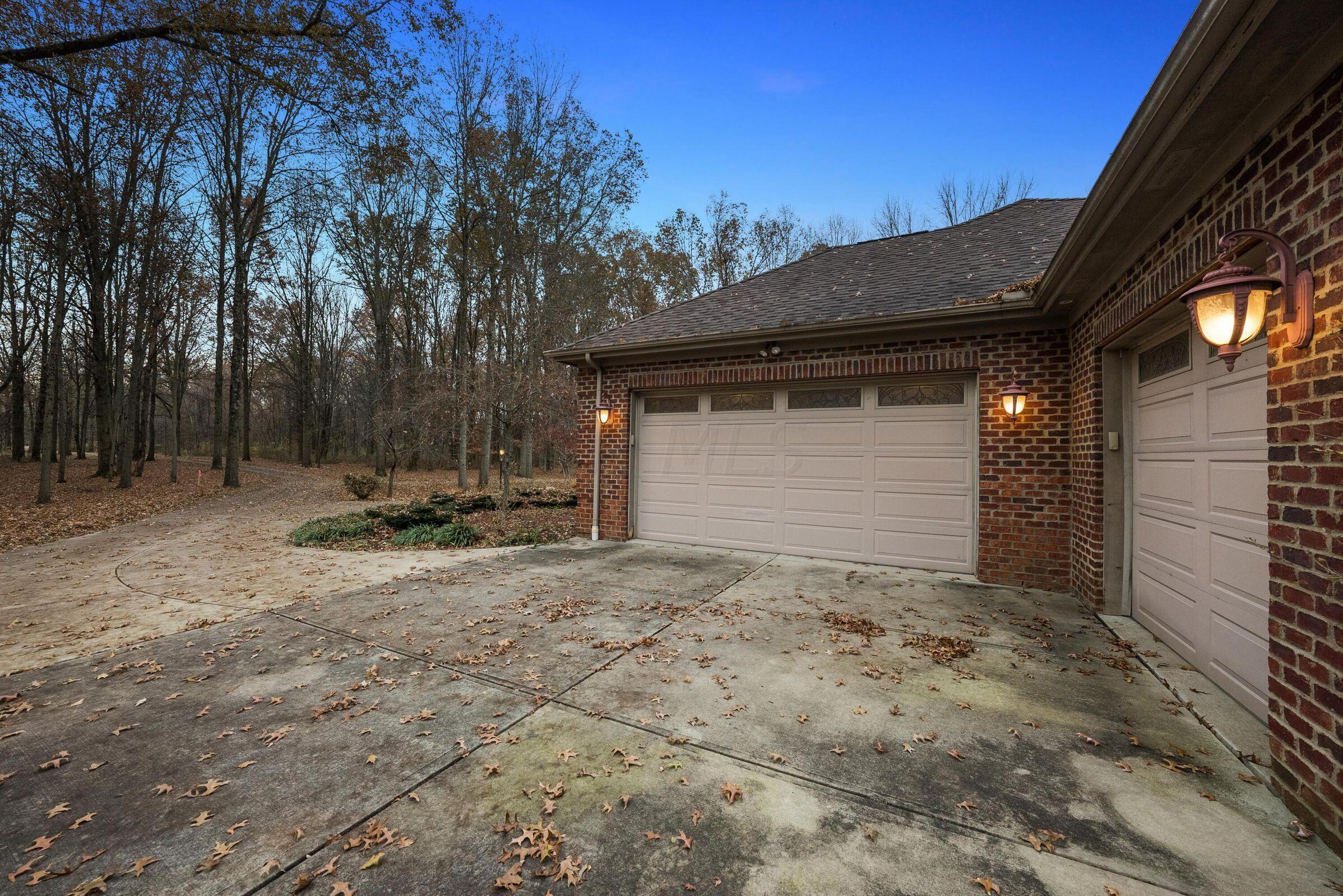 11244 Orchard Road Galena, OH 43021 - Photo 70 of 70 Sideloading Garages