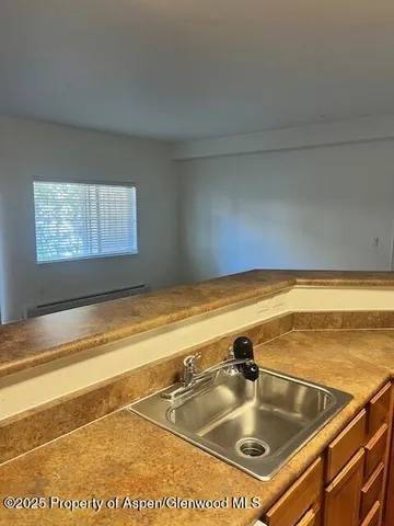 a view of a hallway to the house