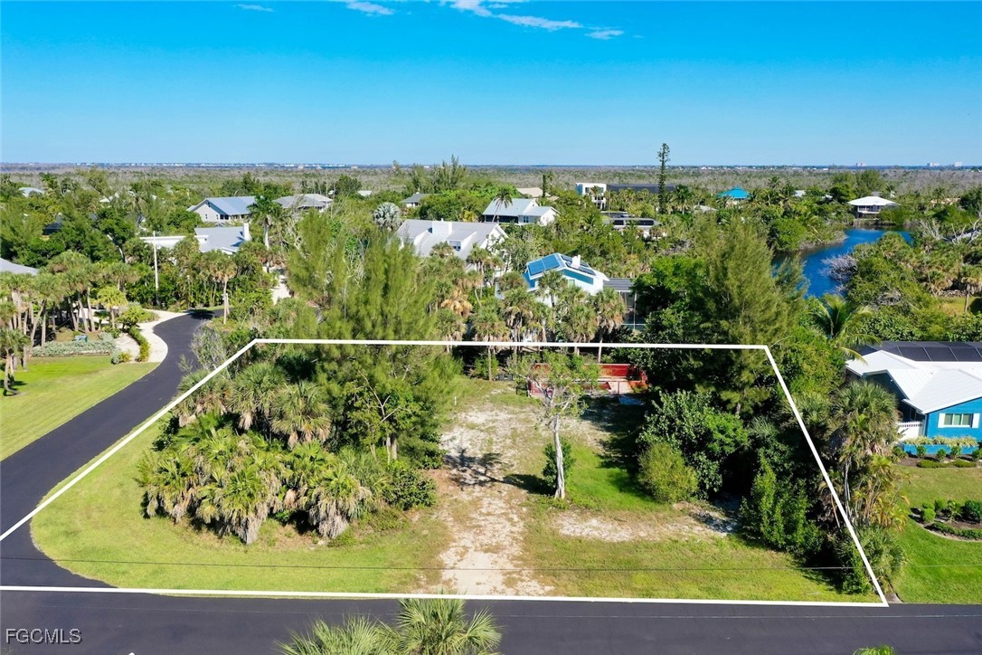 1653 Bunting Lane Sanibel, FL 33957 - Photo 1 of 12 a view of a balcony with lake view