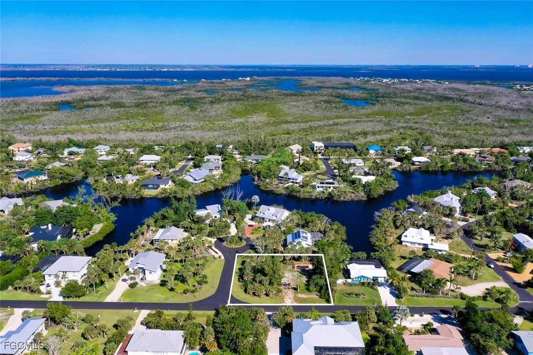 1653 Bunting Lane Sanibel, FL 33957 - Photo 7 of 12 a view of a room with lots of flowers