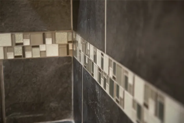 a view of staircase with wooden floor and fan