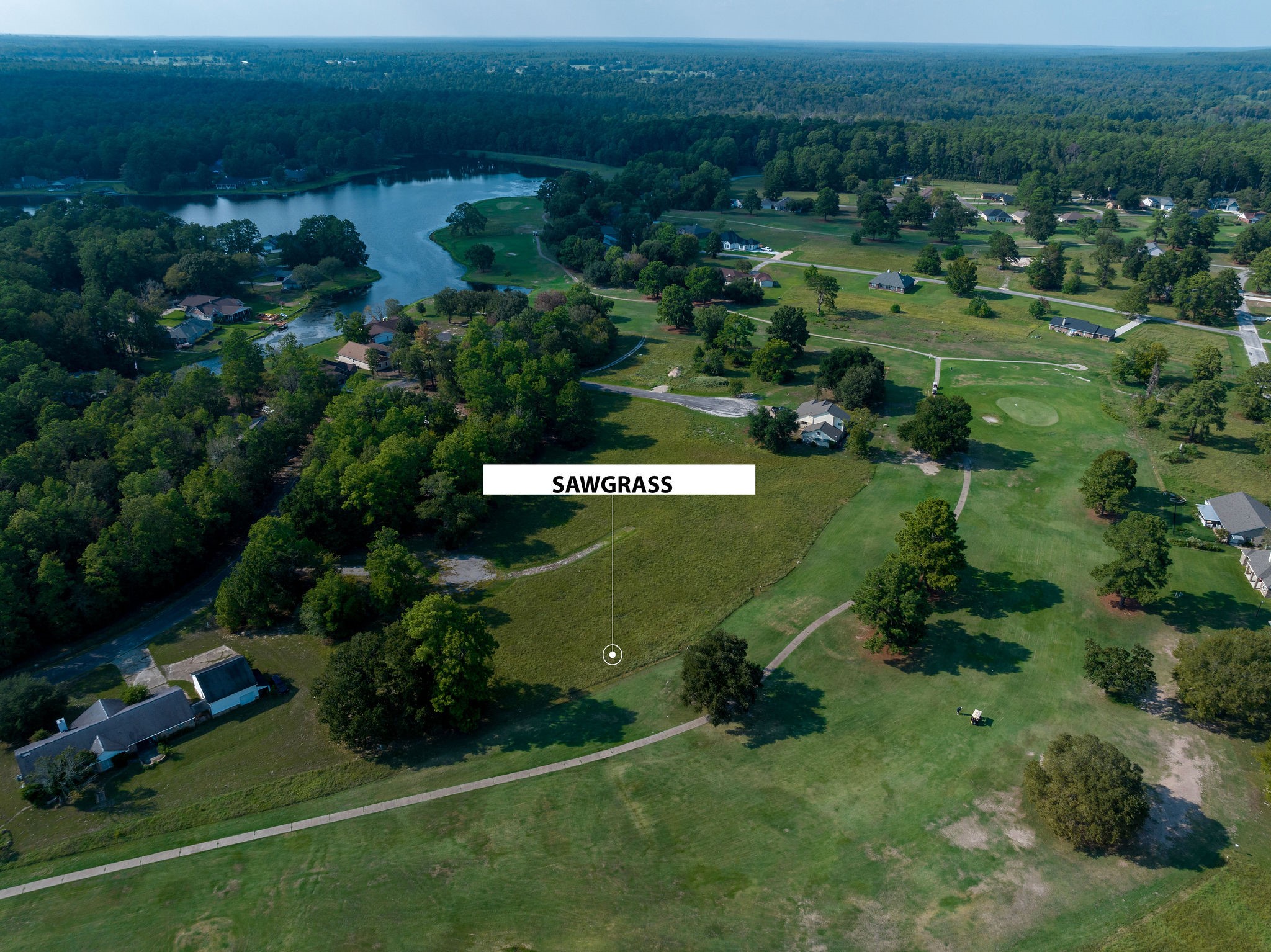 42 Sawgrass Trinity, TX 75862 - Photo 33 of 42 an aerial view of a house with a yard