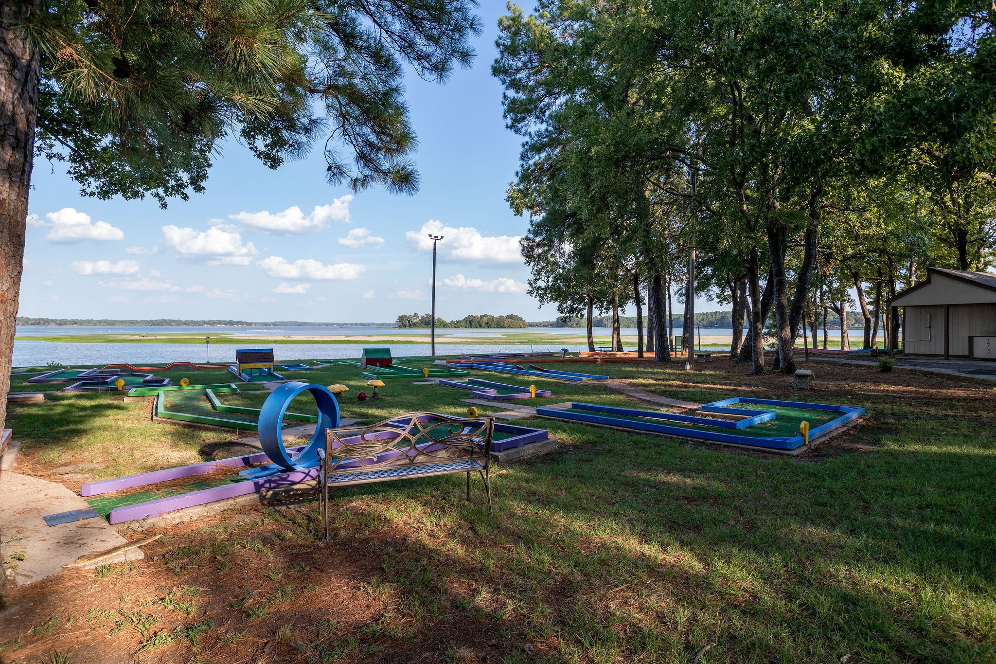 42 Sawgrass Trinity, TX 75862 - Photo 38 of 42 an aerial view of a house with swimming pool a yard and lake view