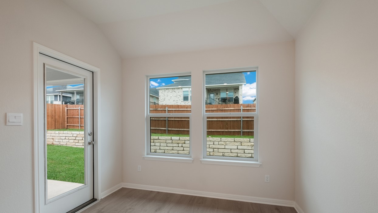 329 Lone Cedar Road Marble Falls, TX 78654 - Photo 12 of 19 an empty room with windows
