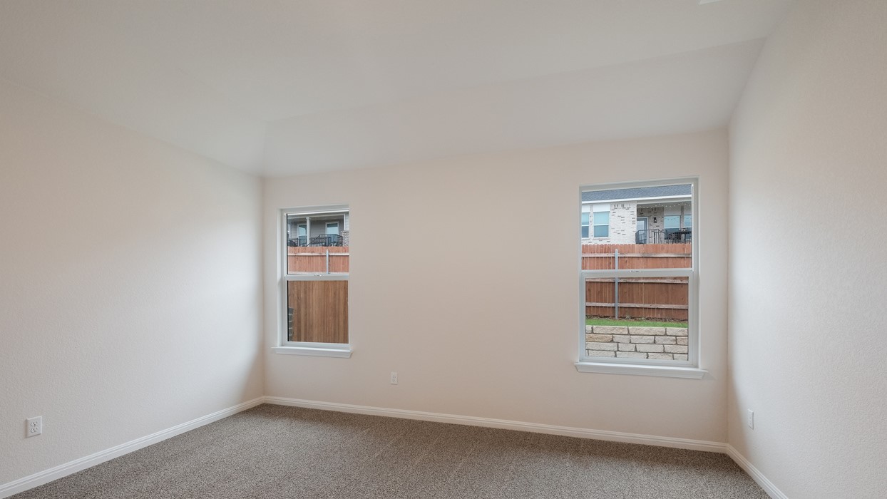 329 Lone Cedar Road Marble Falls, TX 78654 - Photo 13 of 19 an empty room with a window