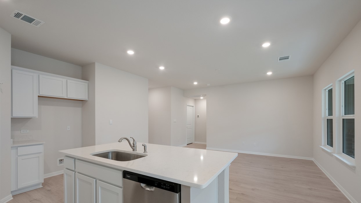 329 Lone Cedar Road Marble Falls, TX 78654 - Photo 10 of 19 a kitchen with sink and microwave