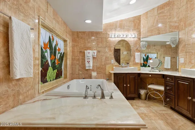 a view of a house with a tree and a yard