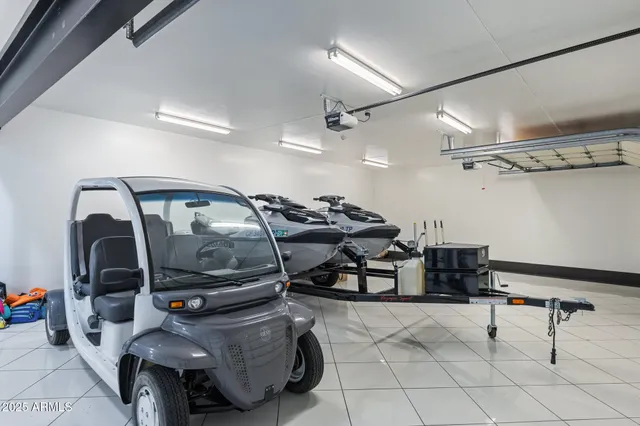 a view of a cars park on the roof deck