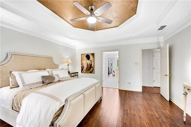 a spacious bathroom with a granite countertop tub sink and mirror