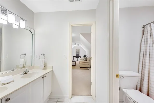 a bathroom with a shower and a tub