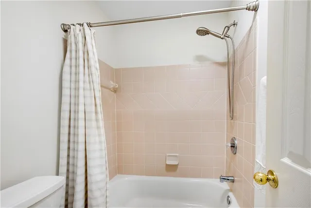 a bathroom with a sink double vanity and a mirror