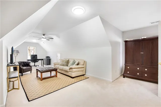 a living room with furniture and a couch