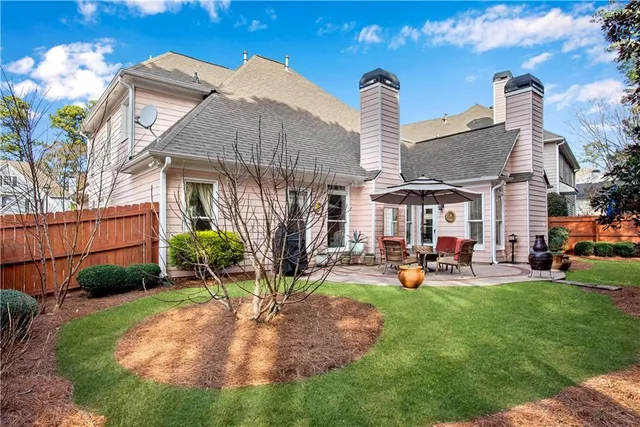 front view of a house with a patio