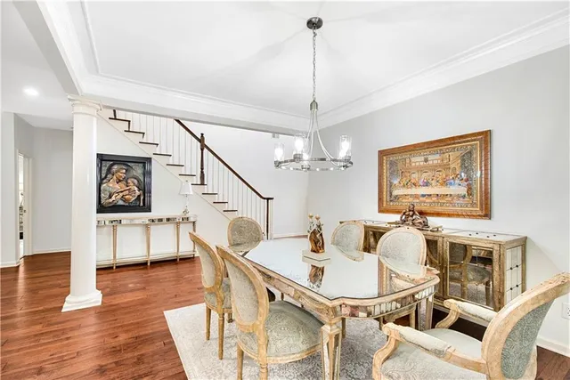 a living room with furniture fireplace and a window