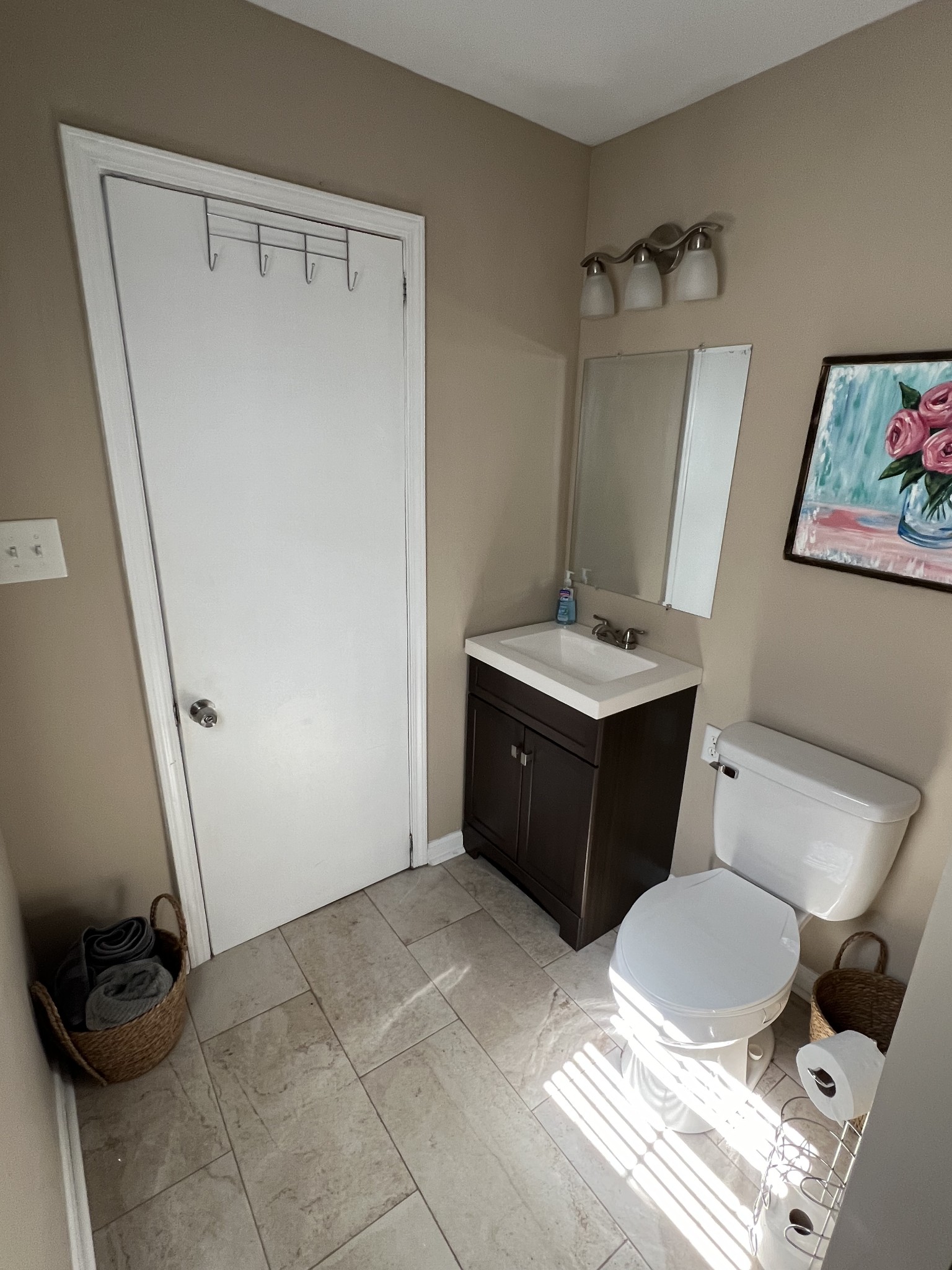 201 Pleasant Street Mount Pleasant, TN 38474 - Photo 24 of 38 a bathroom with a sink vanity mirror and toilet