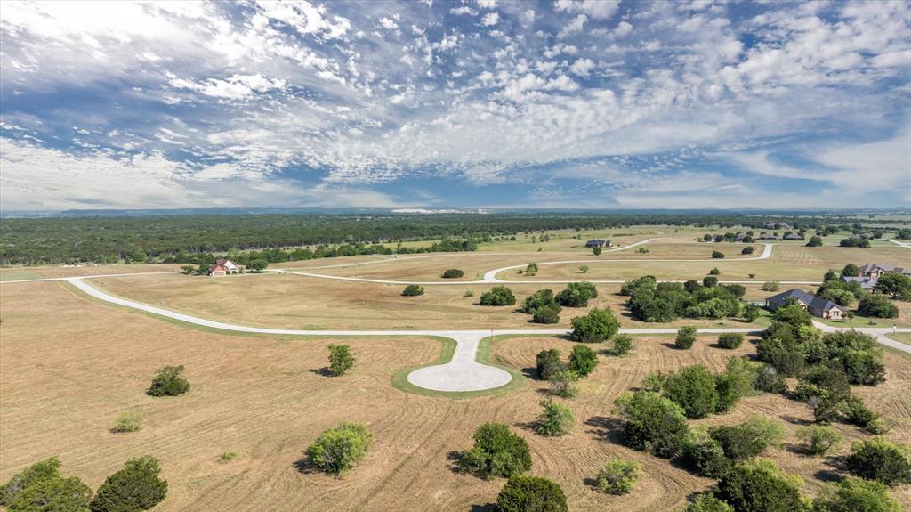 7308 Castle Royle Court Cleburne, TX 76033 - Photo 7 of 35 Drone / aerial view with a rural view