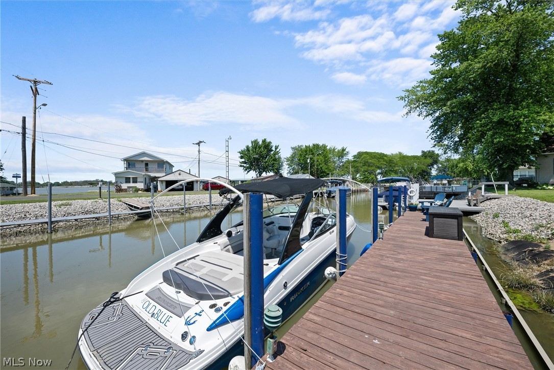 2995 West Rising Sun Road Port Clinton, OH 43452 - Photo 27 of 37 View of dock featuring a water view