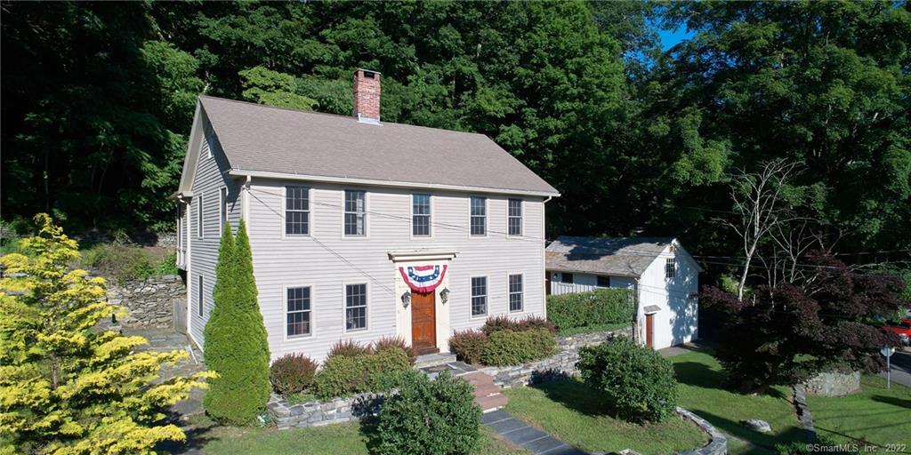 6 Landing Hill Road East Haddam, CT 06423 - Photo 1 of 1 a aerial view of a house with a yard and potted plants