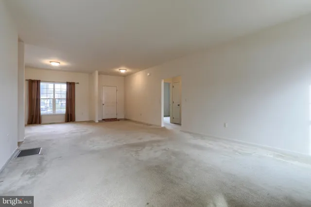 a view of an empty room with window