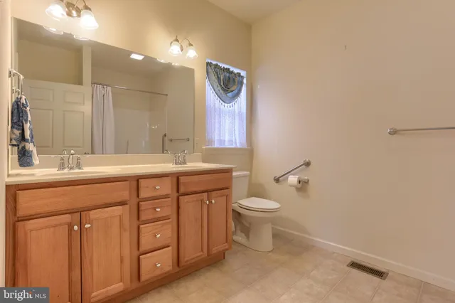 a view of a hallway with a wooden door