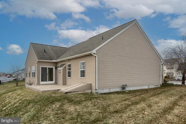 a bathroom with a tub and shower