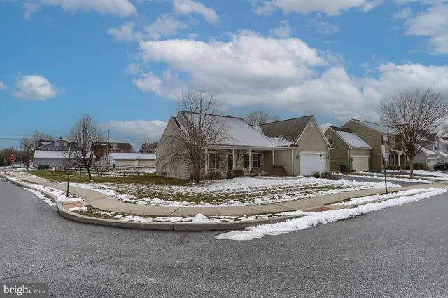 a view of a house with a sink and yard