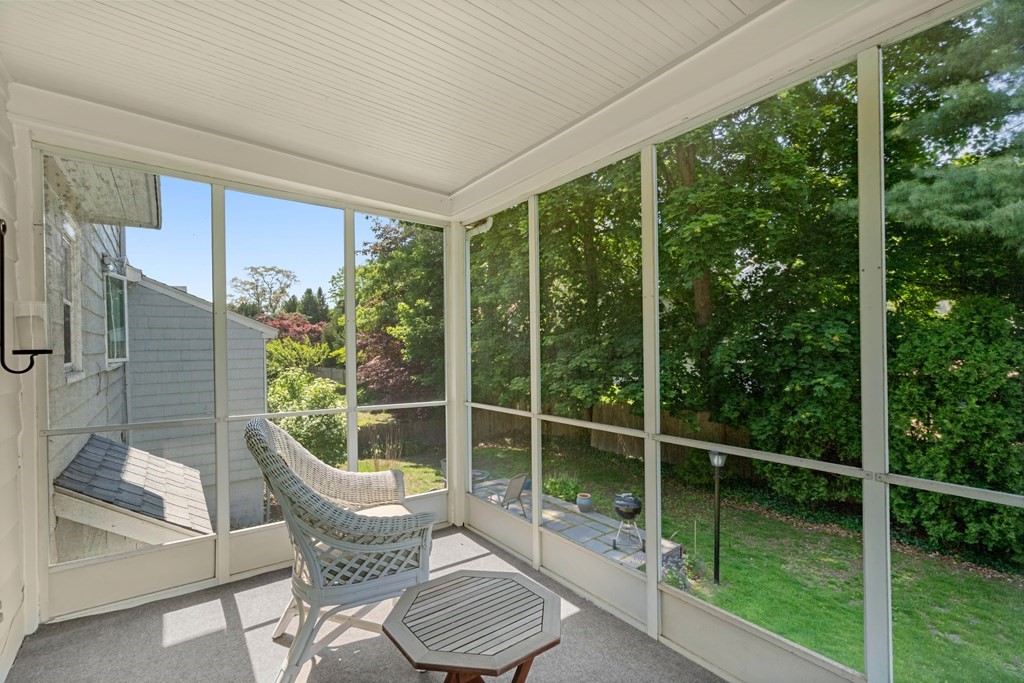 69 Statler Road Belmont, MA 02478 - Photo 15 of 34 a view of a chair and tables in the balcony