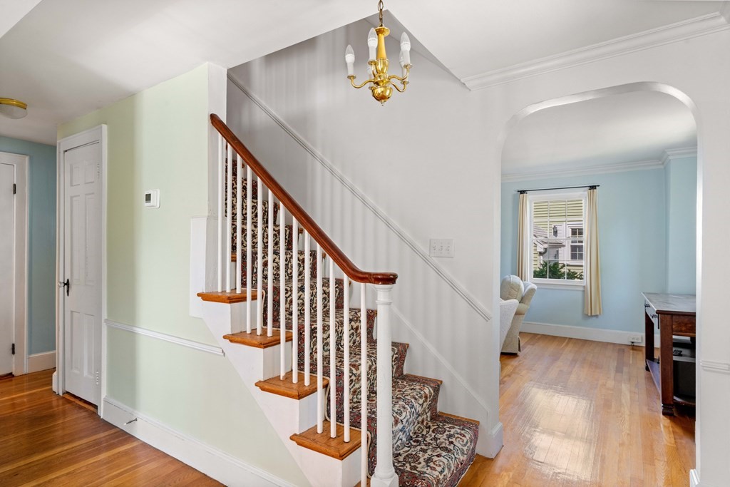 69 Statler Road Belmont, MA 02478 - Photo 2 of 34 a view of entryway and hall with wooden floor
